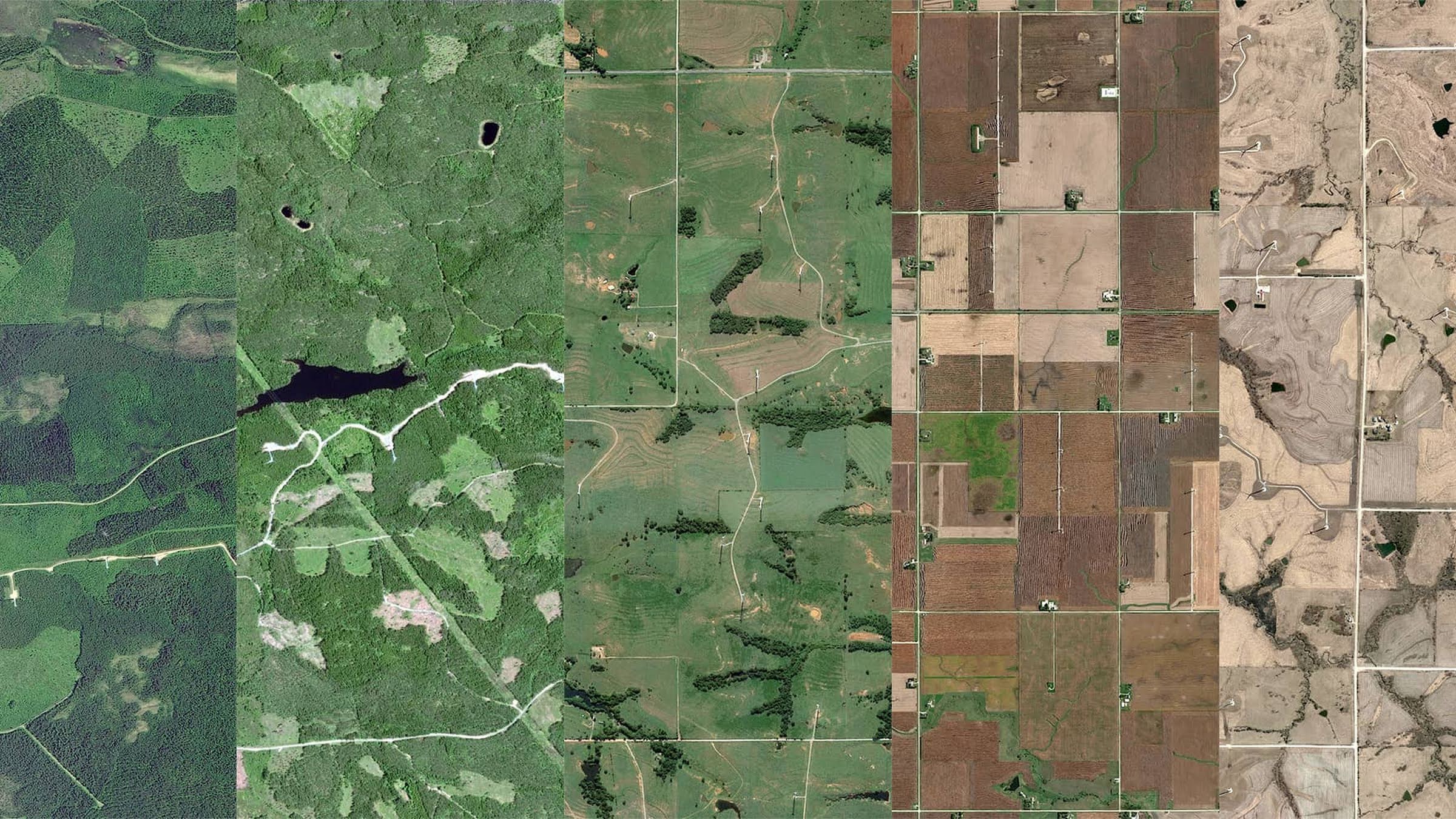 An aerial view of a rich green landscape perfectly edged by a browner landscape.