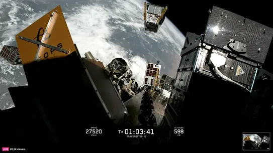 Earth orbit camera view showing small satellites deploying from a spacecraft during the SpaceX Transporter-17 mission, with speed and altitude telemetry overlay.