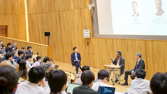 A photo of Ben speaking in front of Tokyo University students.