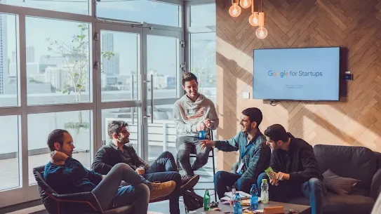 A team of Google for Startups people discussing something.