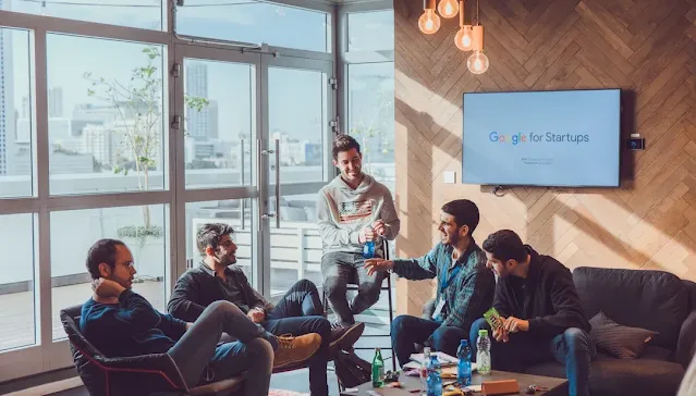 A team of Google for Startups people discussing something.