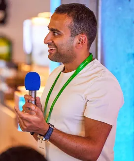 A woman sits on a chair.