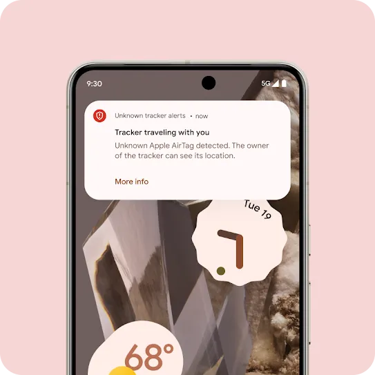 A phone lock screen displaying an alert that reads “Tracker traveling with you."