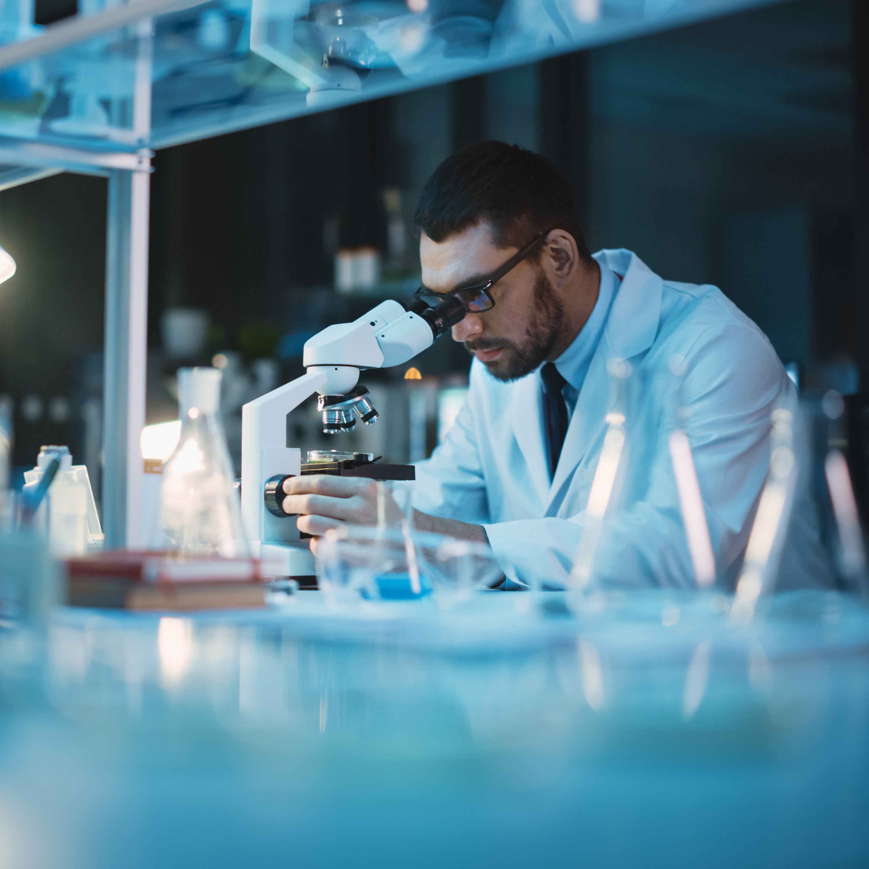 A person is conducting scientific research in a lab in Australia