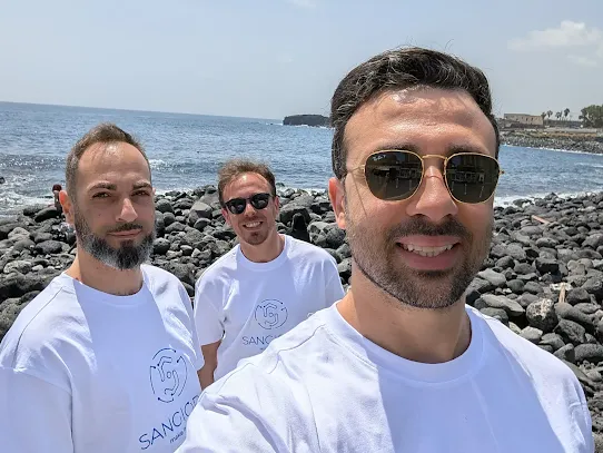 Alessandro Sangiorgi and members of the Sangiorgi SRL team hanging out along the Sicilian coastline