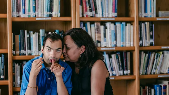 Taku and his mom Anu share a quiet moment at SPARC In Northern Virginia