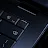 Close-up of the Googlebook keyboard corner showing the power button, volume keys, backspace key, and speakers.