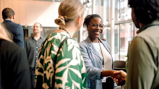people gathered in a casual office space