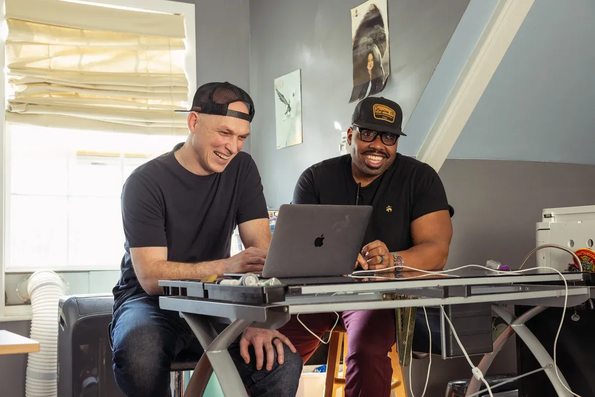 Firesight Studios co-founders Justin Zimmerman and Julius Hubbard, both Chattanooga firefighters, working on their mobile games.