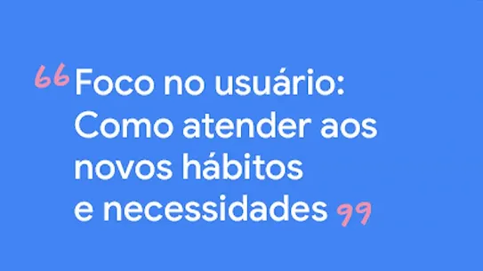 Três homens conversando, sentados em pedras, na praia.