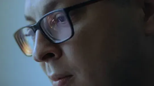 closeup of a man with spectacles