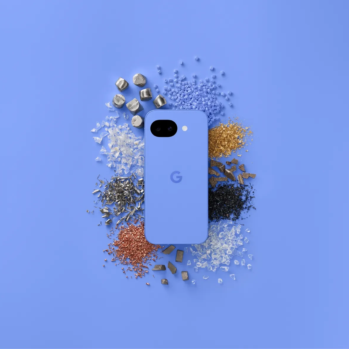 A Pixel phone surrounded by tiny, broken down materials