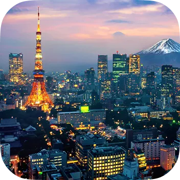 An elevated evening view of the Tokyo skyline, featuring the illuminated orange Tokyo Tower in the foreground and a snow-capped Mount Fuji visible in the distance under a purple and orange sunset sky.