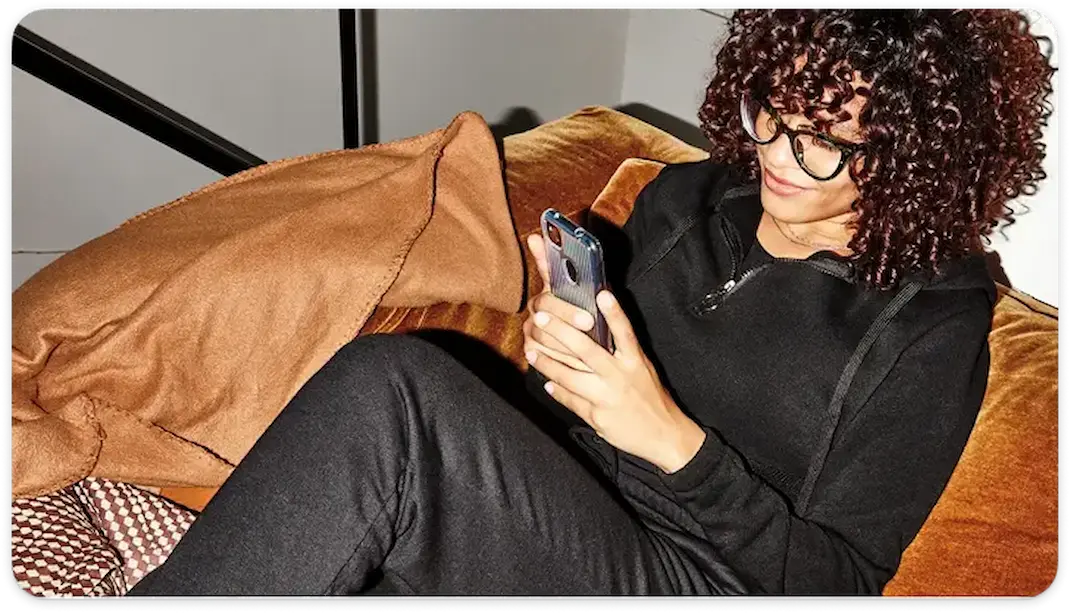 a woman reading a phone