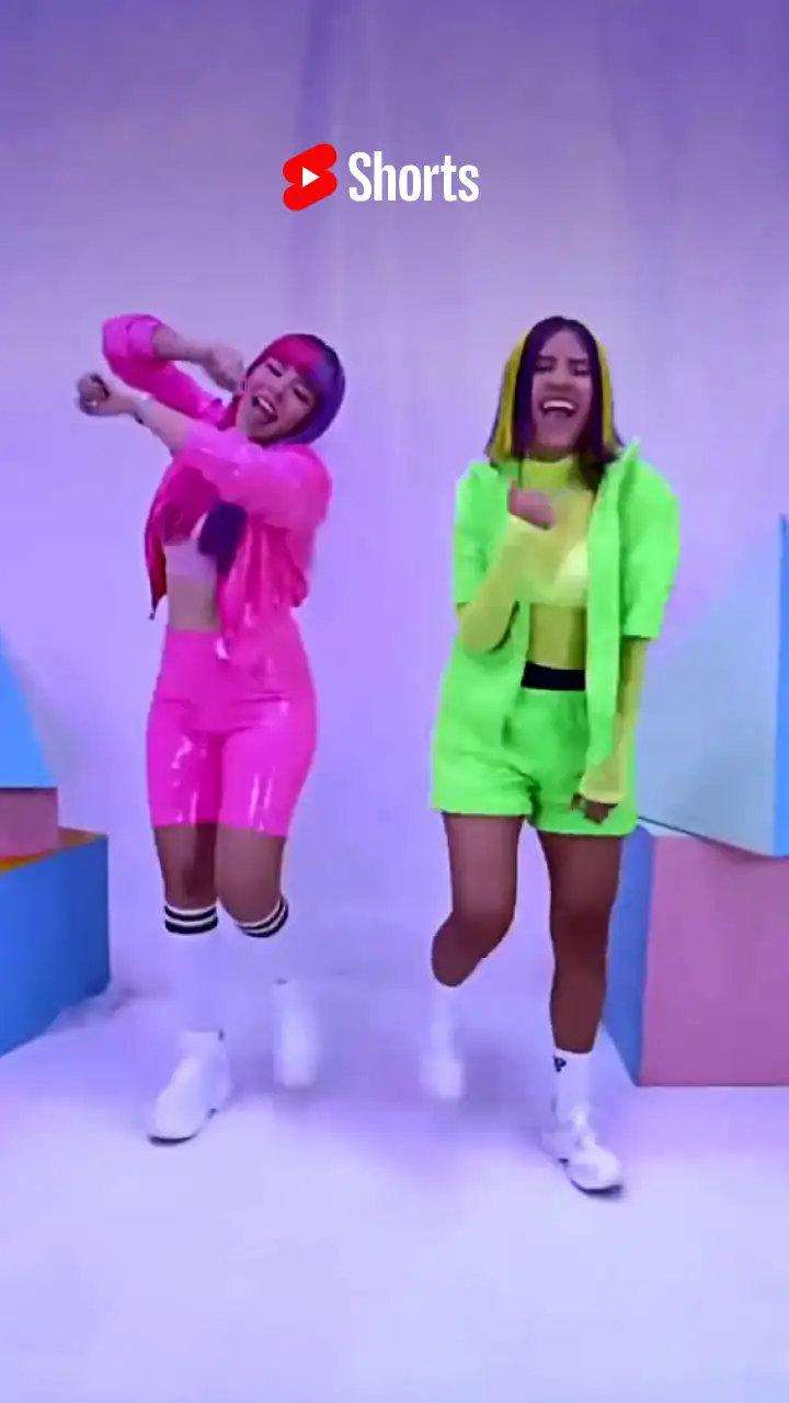 A video thumbnail shows two creators dancing while filming YouTube content