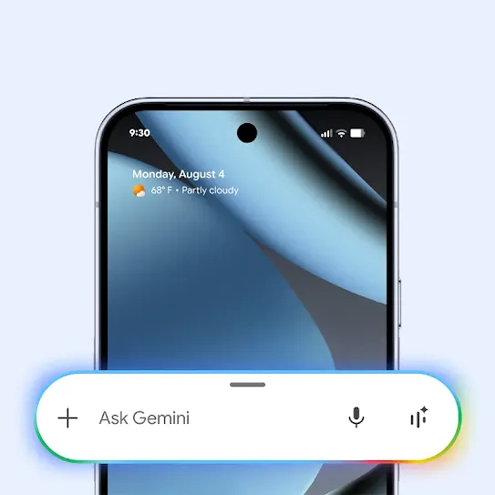 A bar outlined in a rainbow glow appears in front of an Android device. This gateway into Gemini, Google’s AI assistant, allows users to add text, voice, images, or video to leverage generative AI for help writing, planning, brainstorming, and more.