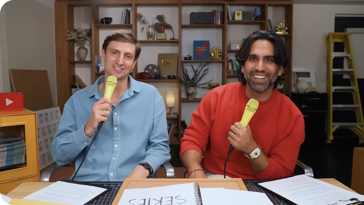 Photo of two creators recording a live stream