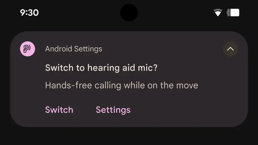 Phone call display showing settings option to switch to hearing aid mic