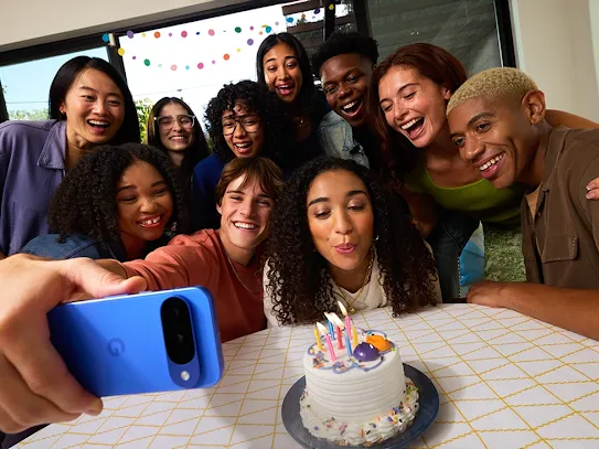 Group selfie with friends celebrating a birthday.