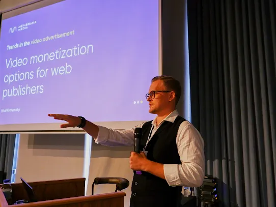 Mikhail speaking at an event.