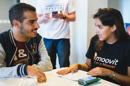 A man and women are busy in a discussion.