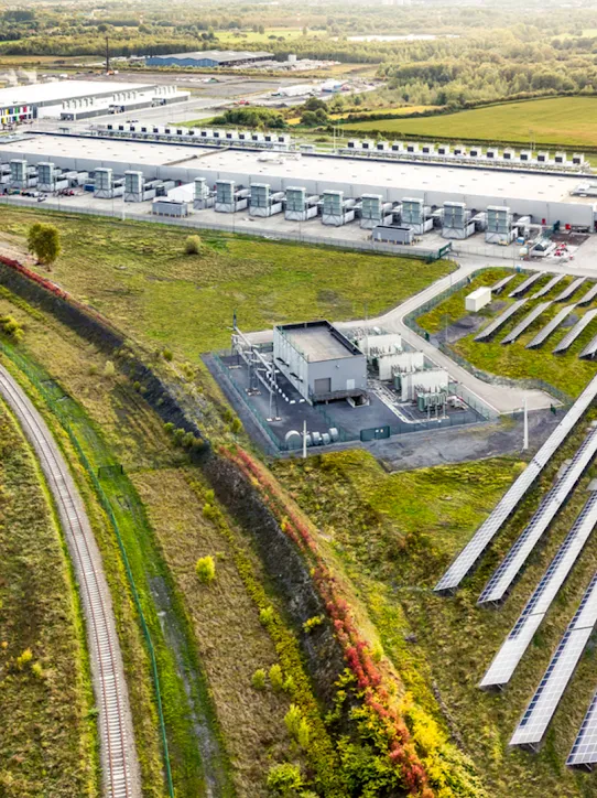 The sun shines over the Google solar field at our St. Ghislain, Belgium data center.