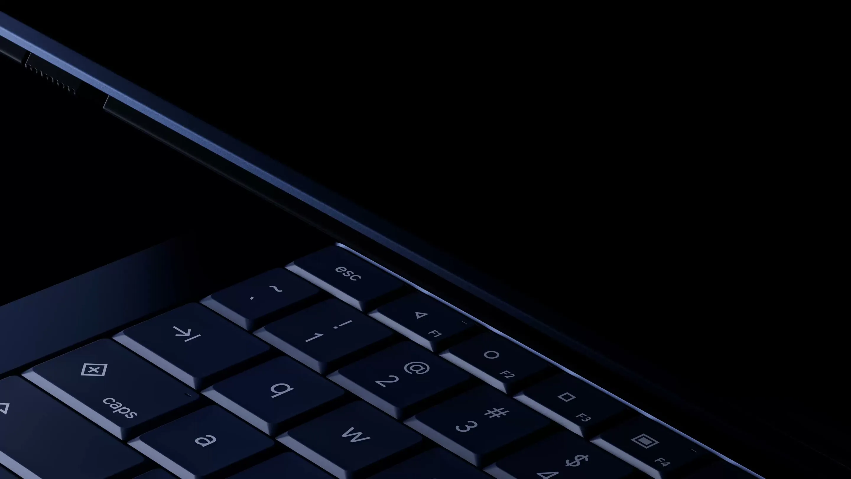 Googlebook laptop slowly opening, viewed from a low angle showing the keyboard and hinge.