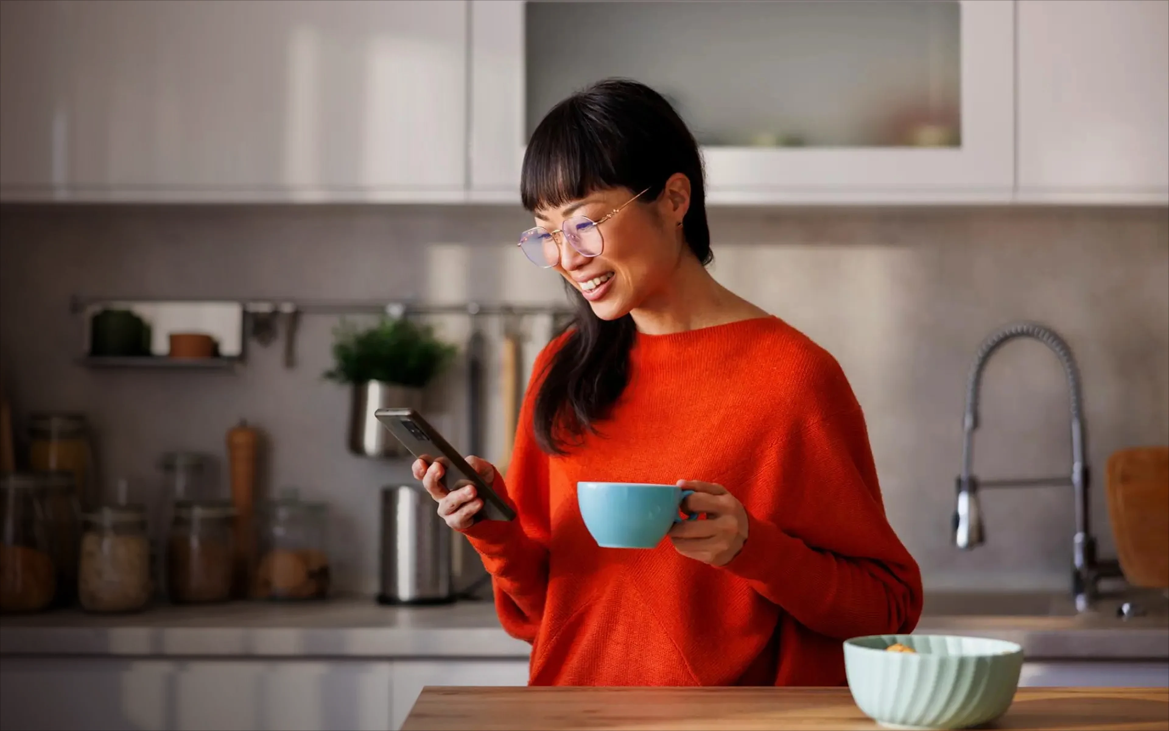 Image of woman using The Google Health App on her phone. 